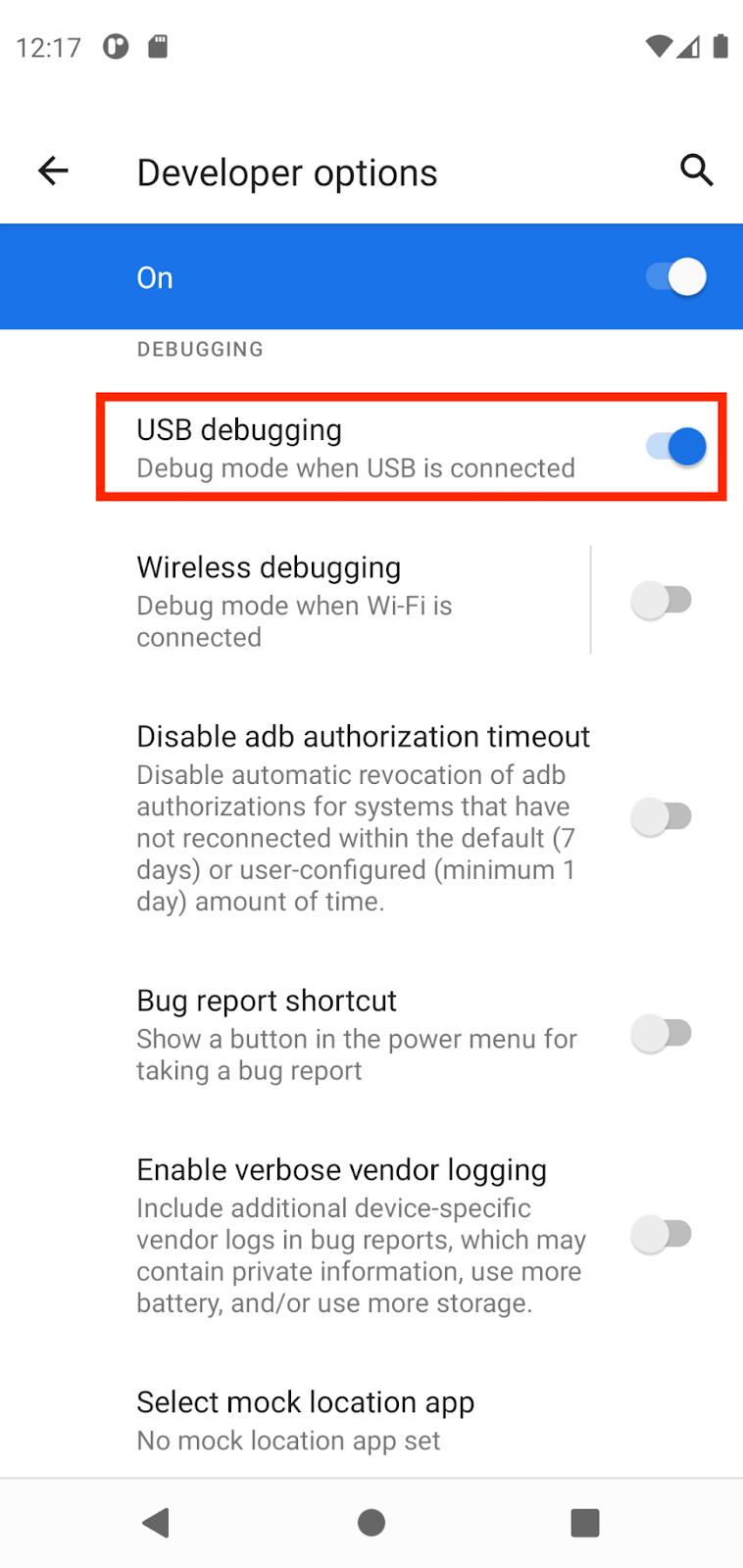 Options pour les développeurs Cette image montre la page "Options" avec l'option "Débogage USB" activée et encadrée en rouge.